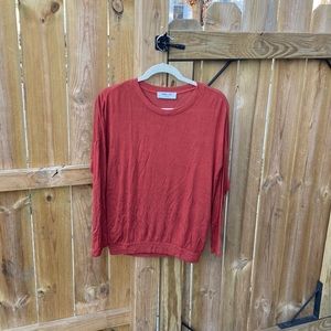 Long sleeve tee shirt in a pretty shade of brick.